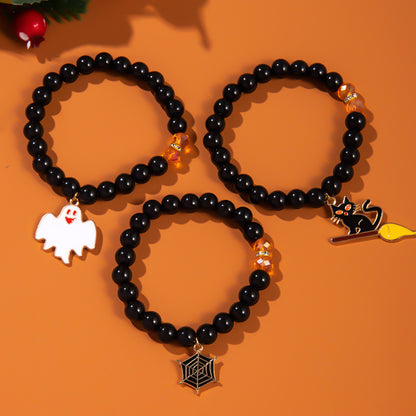 Pulsera gemela de Halloween con colgante de fantasma de calabaza