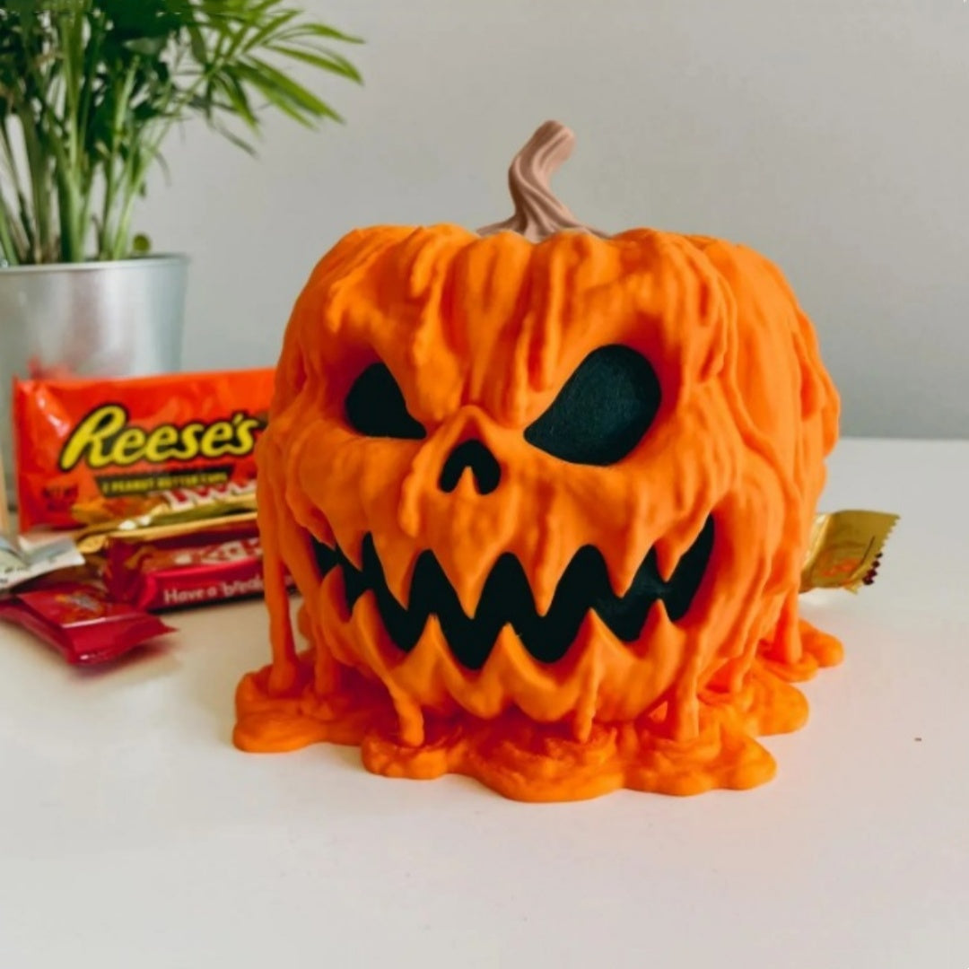 Bol de caramelos derretidos con forma de calabaza para Halloween