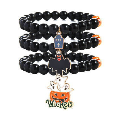 Pulsera gemela de Halloween con colgante de fantasma de calabaza