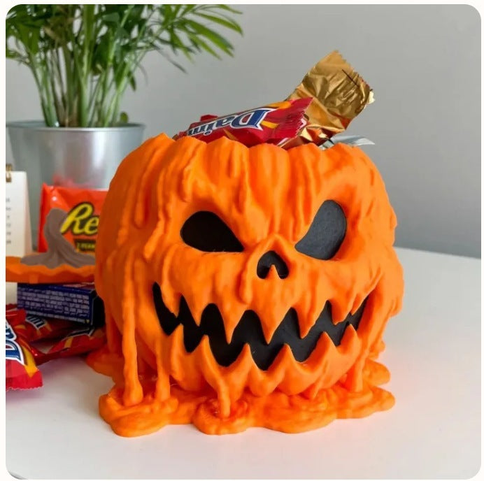 Bol de caramelos derretidos con forma de calabaza para Halloween