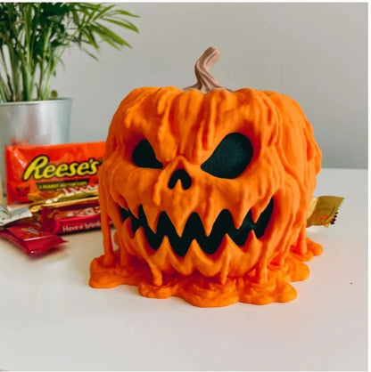 Bol de caramelos derretidos con forma de calabaza para Halloween